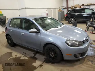 2012 Volkswagen Golf TDI with VIN WVWDM7AJ0CW144803, listed as a Copart auction lot 61574455 with 184,152 mi miles and Salvage title. Bid and sale history available at DreamBid. Image 4.