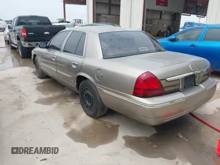 2006 Mercury Grand Marquis GS z VIN 2MEFM74VX6X655255, wystawiony jako IAAI lot #42261870 z przebiegiem Nie podano mil oraz . Historia ofert i sprzedaży dostępna na DreamBid. Obrazek 3.
