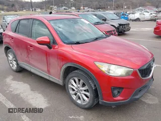 2015 Mazda CX-5 Grand Touring with VIN JM3KE4DY1F0540586, listed as a IAAI auction lot 41710216 with 148,800 mi miles. Bid and sale history available at carsss.com. Image 1.