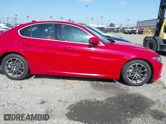 2020 Alfa Romeo Giulia with VIN ZARFAMAN1L7636002, listed as a IAAI auction lot 42121135 with 55,510 mi miles. Bid and sale history available at carsss.com. Image 14.