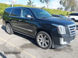 2015 Cadillac Escalade Premium z VIN 1GYS3CKJ5FR237749, wystawiony jako IAAI lot #41922778 z przebiegiem 160 929 mil mil oraz . Historia ofert i sprzedaży dostępna na DreamBid. Obrazek 1.
