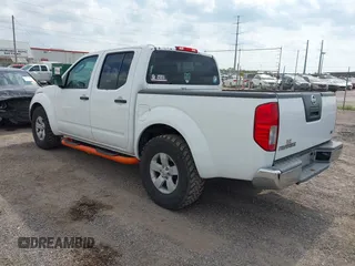 2011 Nissan Frontier SL with VIN 1N6AD0ERXBC424218, listed as a IAAI auction lot 42451520 with 205,866 mi miles and . Bid and sale history available at DreamBid. Image 3.