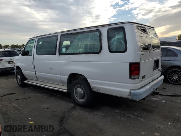 1999 Ford Econoline Passenger XL with VIN 1FBSS31L2XHA95612, listed as a Copart auction lot 72615104 with 211,283 mi miles and Salvage Title. Bid and sale history available at DreamBid. Image 2.