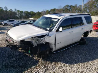 2019 GMC Yukon SLT with VIN 1GKS2BKC7KR170977, listed as a Copart auction lot 42416995 with 111,615 mi miles and Salvage Title. Bid and sale history available at carsss.com. Image 1.