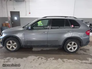 2009 BMW X5 30i with VIN 5UXFE43559L272922, listed as a IAAI auction lot 41723504 with 210,793 mi miles. Bid and sale history available at carsss.com. Image 14.