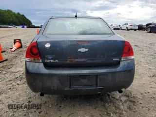 2014 Chevrolet Impala LS with VIN 2G1WA5E33E1127966, listed as a Copart auction lot 61458245 with 166,744 mi miles and Salvage title. Bid and sale history available at DreamBid. Image 6.