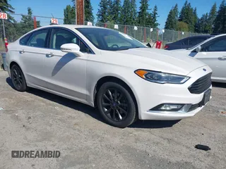 2017 Ford Fusion SE z VIN 3FA6P0HD3HR132779, wystawiony jako IAAI lot #42690212 z przebiegiem 165 293 mil mil oraz . Historia ofert i sprzedaży dostępna na DreamBid. Obrazek 1.