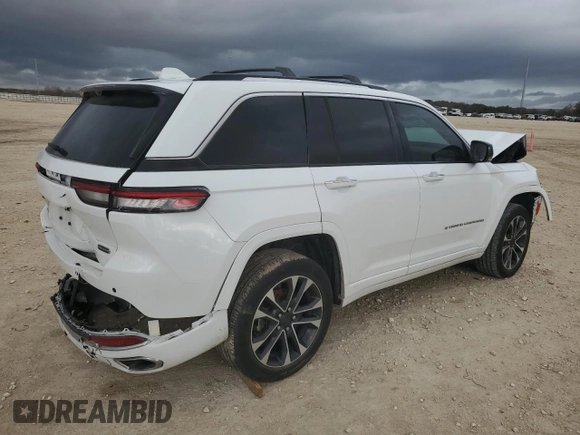 2022 Jeep Grand Cherokee Overland z VIN 1C4RJHDG9N8617593, wystawiony jako Copart lot #84834794 z przebiegiem 38 434 mil mil oraz Szkoda całkowita • Salvage title. Historia ofert i sprzedaży dostępna na DreamBid. Obrazek 3.
