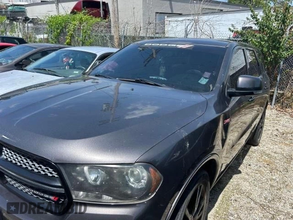 2013 Dodge Durango R/T with VIN 1C4SDHCT0DC689270, listed as a Copart auction lot 66862535 with 169,510 mi miles and Clean title. Bid and sale history available at DreamBid. Image 2.