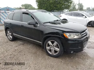 2012 Volkswagen Touareg Lux with VIN WVGEK9BPXCD010820, listed as a IAAI auction lot 42531423 with 206,759 mi miles and . Bid and sale history available at DreamBid. Image 1.