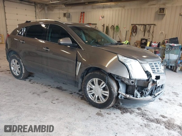 2015 Cadillac SRX Luxury Collection with VIN 3GYFNBE34FS575613, listed as a IAAI auction lot 41697251 with 173,117 mi miles and . Bid and sale history available at DreamBid. Image 1.