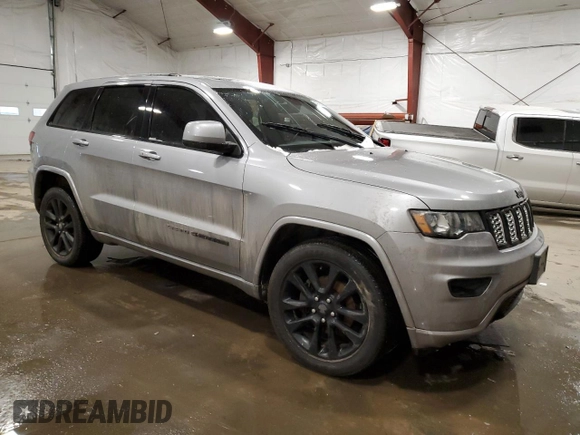 2017 Jeep Grand Cherokee Laredo with VIN 1C4RJFAG5HC700626, listed as a Copart auction lot 42699405 with 118,111 mi miles and Salvage Title. Bid and sale history available at carsss.com. Image 4.