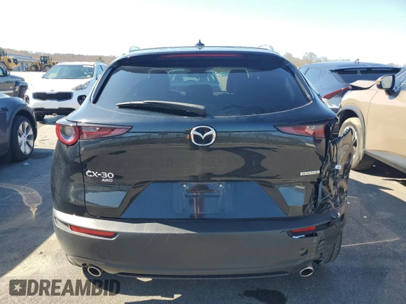 2023 Mazda CX-30 S Premium with VIN 3MVDMBDM6PM571691, listed as a Copart auction lot 53636275 with 38,569 mi miles and Clean Title. Bid and sale history available at DreamBid. Image 6.
