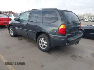 2005 GMC Envoy SLT with VIN 1GKDT13S352258833, listed as a IAAI auction lot 41525149 with 213,829 mi miles. Bid and sale history available at carsss.com. Image 3.