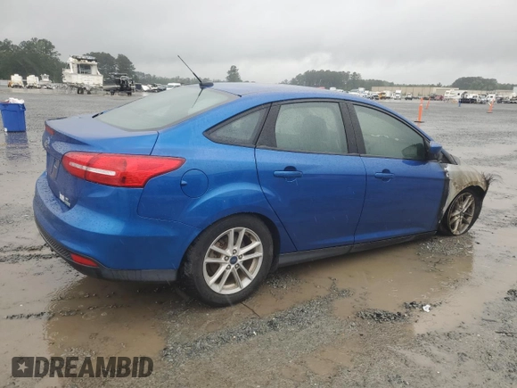 2018 Ford Focus SE z VIN 1FADP3FE6JL227653, wystawiony jako Copart lot #56827585 z przebiegiem Nie podano mil oraz Szkoda całkowita • Salvage title. Historia ofert i sprzedaży dostępna na DreamBid. Obrazek 3.