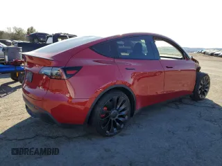 2023 Tesla Model Y Performance with VIN 7SAYGDEFXPF790747, listed as a Copart auction lot 42233855 with 25,452 mi miles and Salvage Title. Bid and sale history available at DreamBid. Image 3.