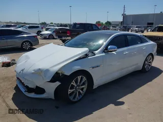 2012 Jaguar XJ XJL with VIN SAJWA2GB3CLV38500, listed as a IAAI auction lot 41990409 with 73,793 mi miles and . Bid and sale history available at DreamBid. Image 17.