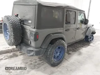2020 Jeep Wrangler Unlimited Sport Altitude with VIN 1C4HJXDG7LW167909, listed as a IAAI auction lot 41413004 with 69,631 mi miles and . Bid and sale history available at DreamBid. Image 4.