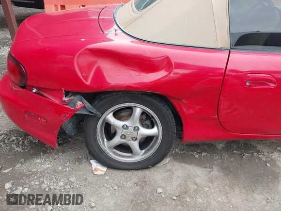 1999 Mazda MX-5 Miata with VIN JM1NB3531X0120856, listed as a IAAI auction lot 41531407 with 92,512 mi miles and . Bid and sale history available at DreamBid. Image 6.