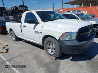 2014 Ram 1500 Tradesman z VIN 3C6JR6DT8EG226167, wystawiony jako IAAI lot #42018502 z przebiegiem 102 695 mil mil oraz . Historia ofert i sprzedaży dostępna na DreamBid. Obrazek 1.