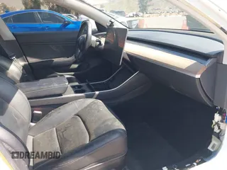 2018 Tesla Model 3 Long Range Battery with VIN 5YJ3E1EAXJF108781, listed as a IAAI auction lot 41962628 with 61,208 mi miles and . Bid and sale history available at DreamBid. Image 5.