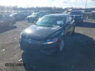 2013 Volkswagen Passat Wolfsburg Edition with VIN 1VWAP7A38DC070025, listed as a IAAI auction lot 41673451 with 107,693 mi miles. Bid and sale history available at carsss.com. Image 2.