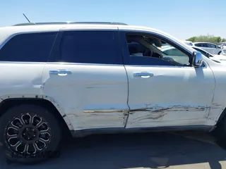 2011 Jeep Grand Cherokee Overland with VIN 1J4RR6GT2BC647589, listed as a IAAI auction lot 42603134 with 153,570 mi miles and . Bid and sale history available at DreamBid. Image 13.