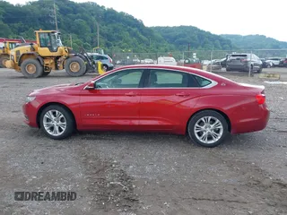 2014 Chevrolet Impala LT with VIN 1G1115SL7EU143042, listed as a IAAI auction lot 42445383 with 57,457 mi miles and . Bid and sale history available at DreamBid. Image 14.
