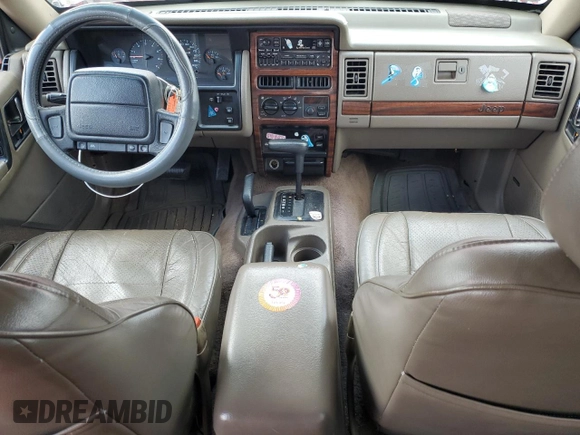 1995 Jeep Grand Cherokee Limited with VIN 1J4GZ78S7SC678078, listed as a Copart auction lot 52203834 with 269,423 mi miles and Salvage title. Bid and sale history available at DreamBid. Image 8.