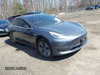 2018 Tesla Model 3 Long Range Battery z VIN 5YJ3E1EB1JF093175, wystawiony jako IAAI lot #41766128 z przebiegiem Nie podano mil oraz . Historia ofert i sprzedaży dostępna na DreamBid. Obrazek 1.