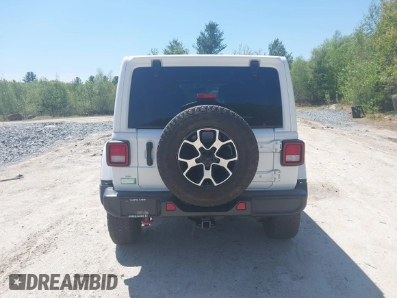 2021 Jeep Wrangler Unlimited Rubicon with VIN 1C4HJXFG5MW586842, listed as a IAAI auction lot 42186683 with 76,450 mi miles and . Bid and sale history available at DreamBid. Image 16.