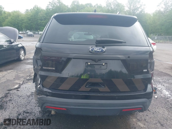 2017 Ford Police Interceptor Utility with VIN 1FM5K8ARXHGD57454, listed as a IAAI auction lot 42233888 with 121,244 mi miles and . Bid and sale history available at DreamBid. Image 16.