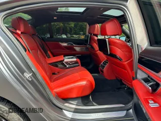 2018 BMW 7 Series M760i xDrive z VIN WBA7H6C54JG614931, wystawiony jako Copart lot #59110125 z przebiegiem 71 953 mil mil oraz Czysty tytuł • Clean title. Historia ofert i sprzedaży dostępna na DreamBid. Obrazek 5.