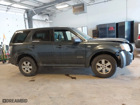 2008 Mercury Mariner with VIN 4M2CU81158KJ14013, listed as a IAAI auction lot 41305863 with 229,672 mi miles. Bid and sale history available at carsss.com. Image 13.