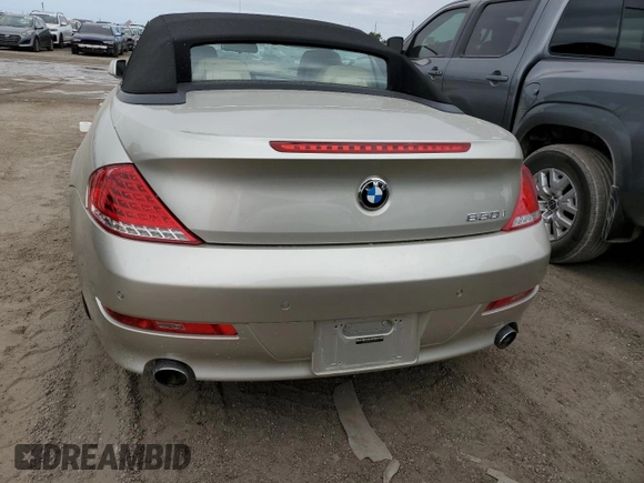2009 BMW 6 Series 650i with VIN WBAEB53599CX64829, listed as a Copart auction lot 75694824 with 0 mi miles and Salvage Title. Bid and sale history available at carsss.com. Image 6.