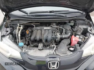 2016 Honda Fit LX with VIN JHMGK5H53GX020149, listed as a IAAI auction lot 42594205 with 183,414 mi miles and . Bid and sale history available at DreamBid. Image 10.