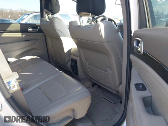 2011 Jeep Grand Cherokee Laredo z VIN 1J4RR4GG2BC511289, wystawiony jako IAAI lot #41240075 z przebiegiem 88 140 mil mil oraz . Historia ofert i sprzedaży dostępna na DreamBid. Obrazek 8.