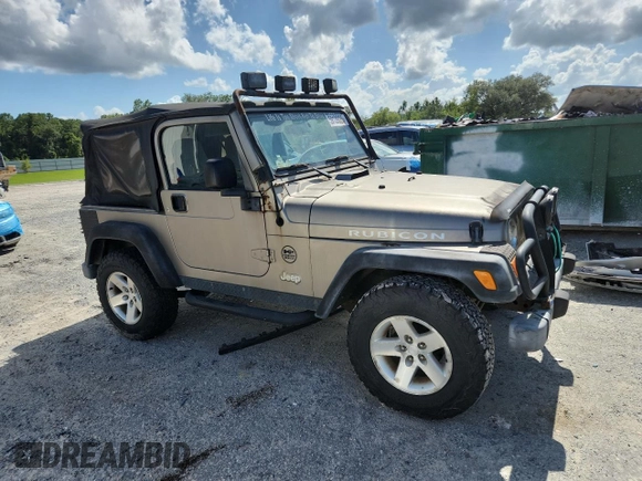 2003 Jeep Wrangler Rubicon with VIN 1J4FA69S13P310131, listed as a Copart auction lot 59139025 with 260,349 mi miles and Salvage title. Bid and sale history available at DreamBid. Image 4.