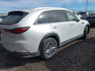 2024 Mazda CX-90 Preferred Plus with VIN JM3KKCHD9R1120051, listed as a IAAI auction lot 41574913 with 44,541 mi miles and . Bid and sale history available at DreamBid. Image 4.