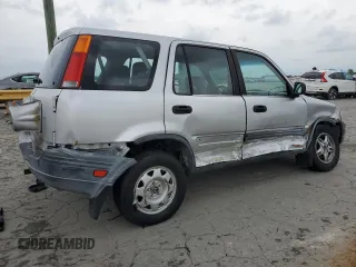 1999 Honda CR-V LX z VIN JHLRD1847XC040936, wystawiony jako Copart lot #56286075 z przebiegiem 296 489 mil mil oraz Szkoda całkowita • Salvage title. Historia ofert i sprzedaży dostępna na DreamBid. Obrazek 3.