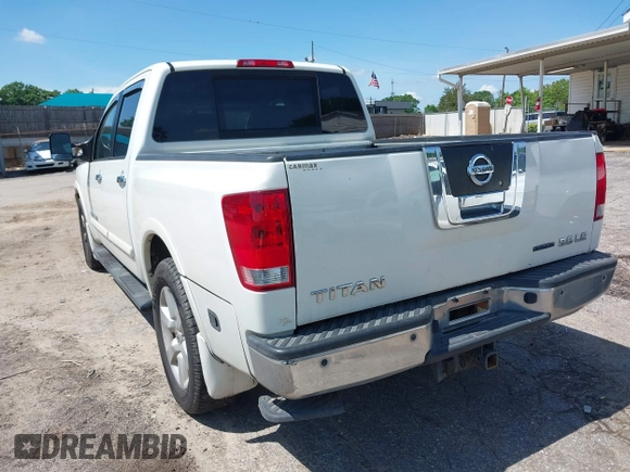 2010 Nissan Titan SE with VIN 1N6BA0ED4AN323907, listed as a IAAI auction lot 42113512 with 198,530 mi miles. Bid and sale history available at carsss.com. Image 3.