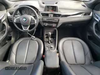 2017 BMW X1 xDrive28i with VIN WBXHT3C32H5F76601, listed as a Copart auction lot 49889965 with 95,655 mi miles and Salvage Title. Bid and sale history available at carsss.com. Image 8.
