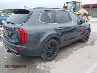 2021 Kia Telluride SX with VIN 5XYP5DHC9MG095972, listed as a IAAI auction lot 42345283 with 125,548 mi miles and . Bid and sale history available at DreamBid. Image 4.