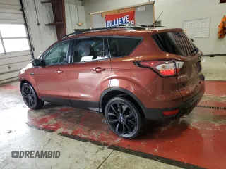 2018 Ford Escape SE z VIN 1FMCU9GD8JUC84420, wystawiony jako Copart lot #57386805 z przebiegiem 80 814 mil mil oraz Szkoda całkowita • Salvage title. Historia ofert i sprzedaży dostępna na DreamBid. Obrazek 2.