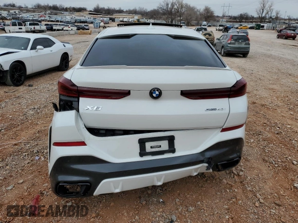2021 BMW X6 sDrive40i z VIN 5UXCY4C03M9H36510, wystawiony jako Copart lot #86419524 z przebiegiem Nie podano mil oraz Szkody całkowita. Historia ofert i sprzedaży dostępna na DreamBid. Obrazek 6.