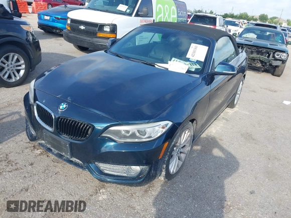 2015 BMW 2 Series 228i with VIN WBA1K5C58FV473737, listed as a IAAI auction lot 42383363 with Not provided miles and . Bid and sale history available at DreamBid. Image 2.
