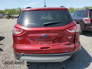 2014 Ford Escape SE z VIN 1FMCU9GX6EUD35235, wystawiony jako Copart lot #54877015 z przebiegiem 163 702 mil mil oraz Szkoda całkowita • Salvage title. Historia ofert i sprzedaży dostępna na DreamBid. Obrazek 6.