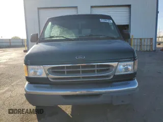 1999 Ford Econoline Passenger XL with VIN 1FMRE1126XHB41841, listed as a Copart auction lot 51338135 with 161,416 mi miles and Clean title. Bid and sale history available at DreamBid. Image 5.