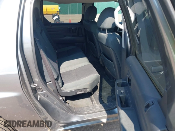 2009 Honda Ridgeline RTS z VIN 5FPYK16479B107114, wystawiony jako IAAI lot #42452199 z przebiegiem 206 853 mil mil oraz . Historia ofert i sprzedaży dostępna na DreamBid. Obrazek 8.