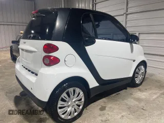 2012 Smart fortwo Pure z VIN WMEEJ3BA5CK540092, wystawiony jako Copart lot #51878135 z przebiegiem 59 356 mil mil oraz Szkody całkowita. Historia ofert i sprzedaży dostępna na DreamBid. Obrazek 4.